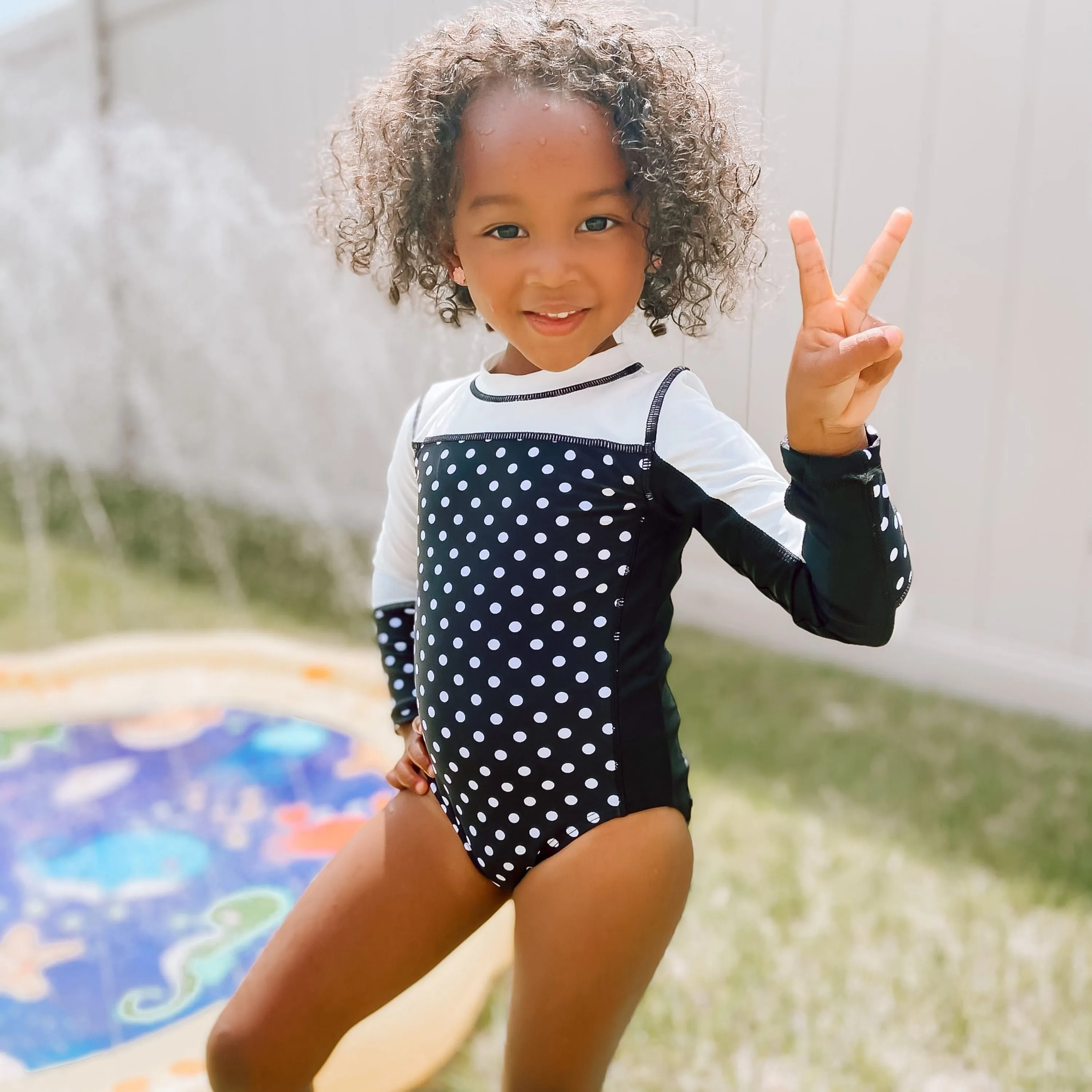 Girls Long Sleeve Surf Suit (One Piece Bodysuit) | "Black Polka Dot"