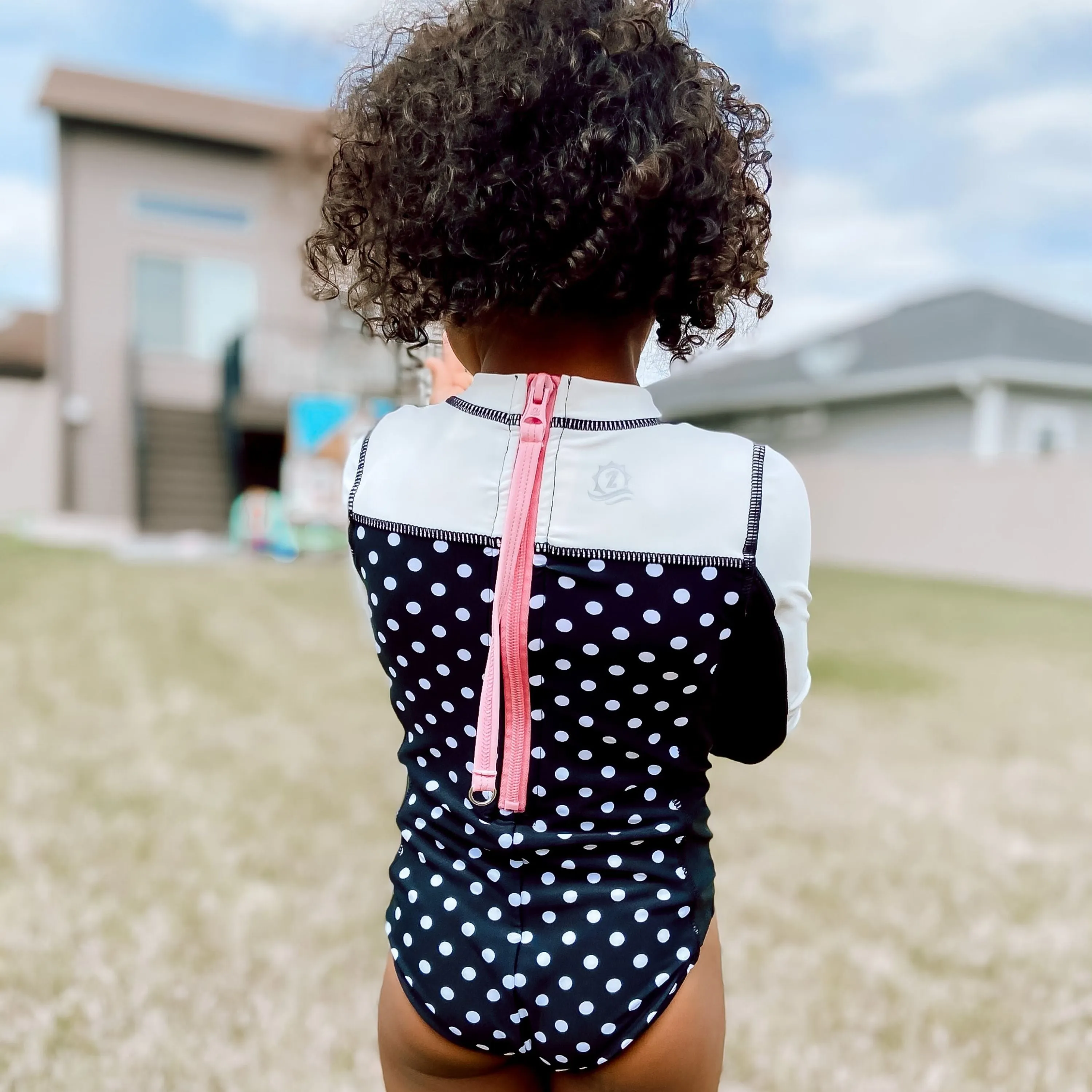 Girls Long Sleeve Surf Suit (One Piece Bodysuit) | "Black Polka Dot"