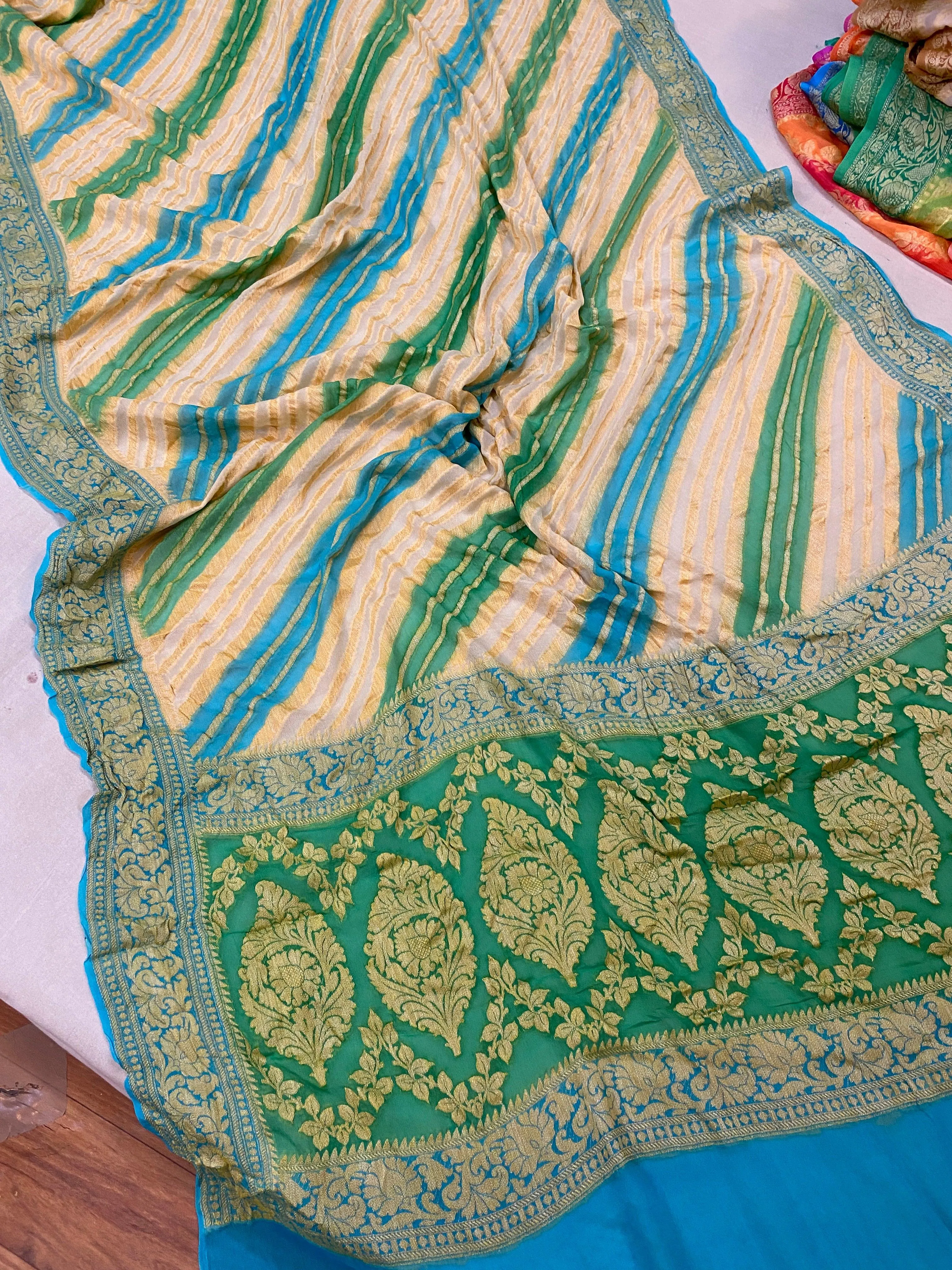 Timeless Elegance: White & Blue Rangkaat Pure Khaddi Georgette Banarasi Saree